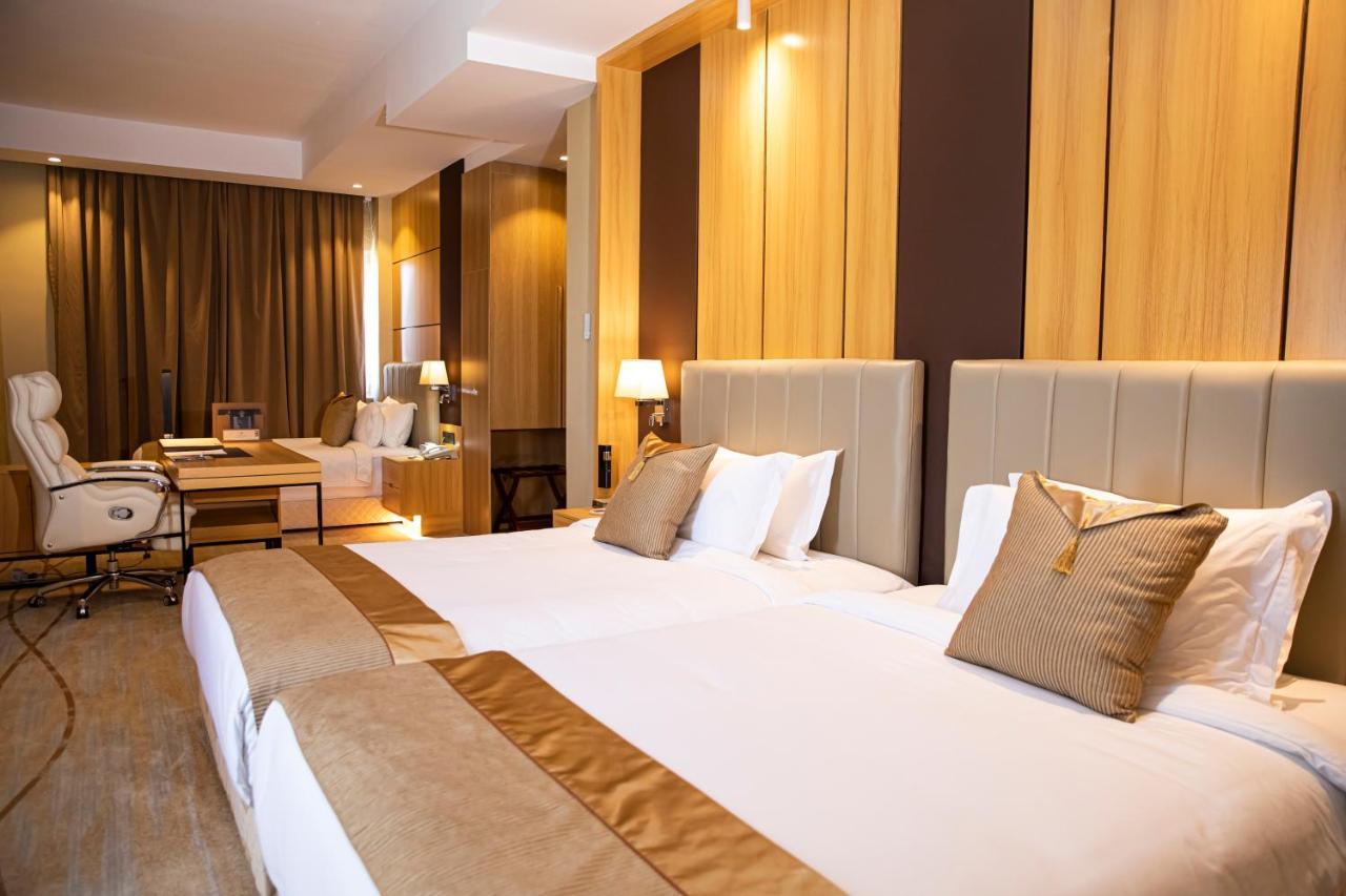 Hotel Diamond Prishtina Pristina Exteriör bild A room at the hotel