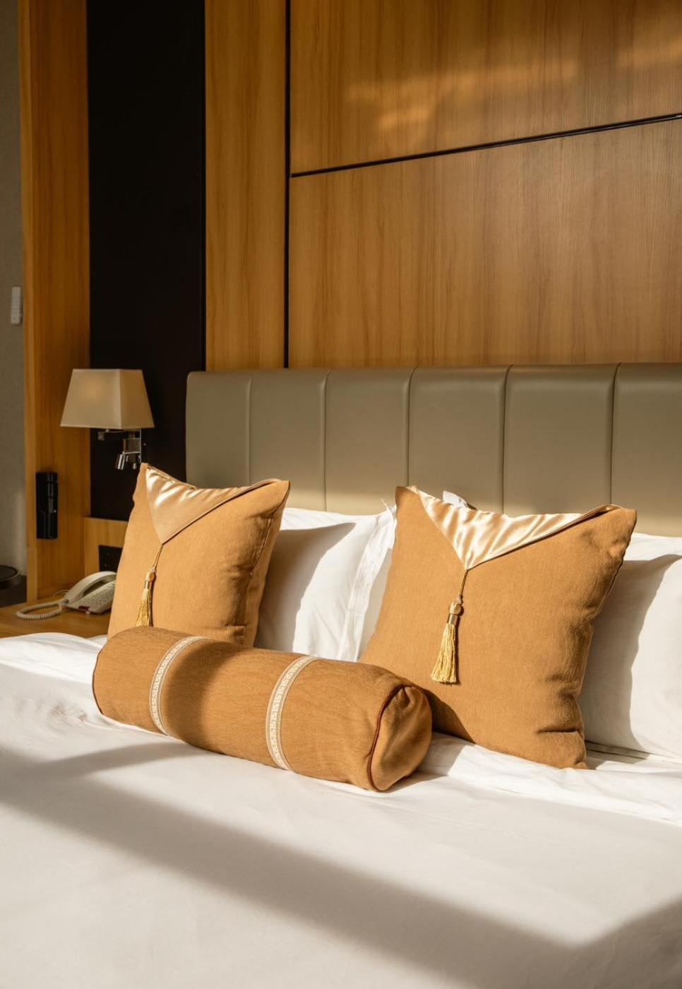 Hotel Diamond Prishtina Pristina Exteriör bild Pillows on a bed