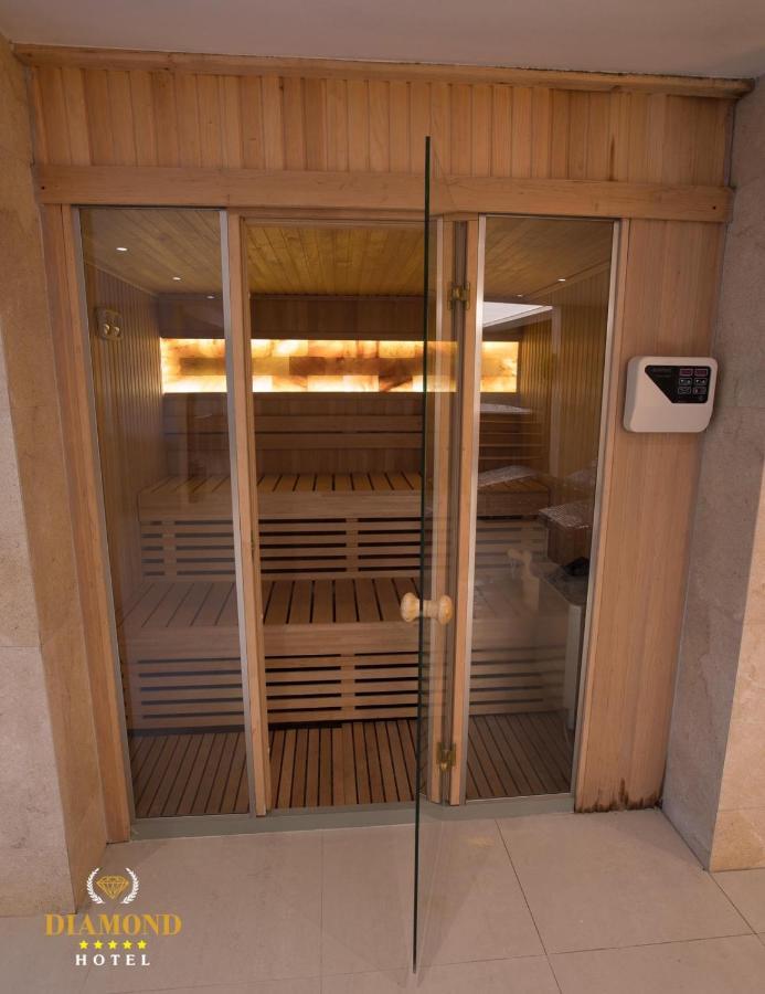 Hotel Diamond Prishtina Pristina Exteriör bild A modern Finnish sauna
